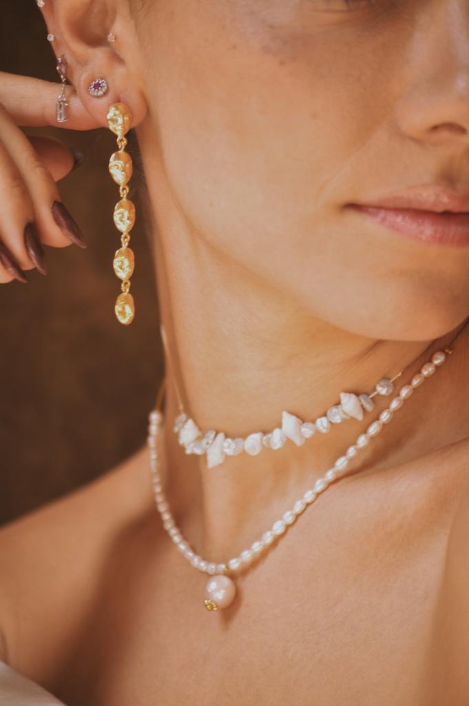Aretes compañía